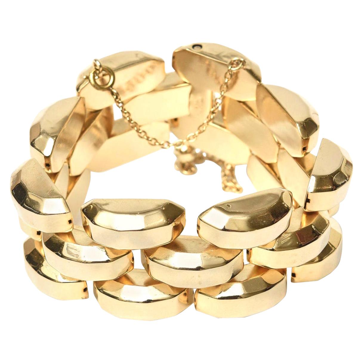 This classic and fabulous retro vintage 1940's style gold plate over sterling silver link bracelet is signed HSR. The design is reminiscent of the 40's but was done in the 60;s. It is chic and forever with a safety catch chain and a pull out pin to