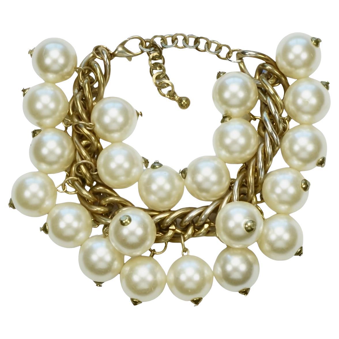 Gold Plated and Ivory Faux Pearl Cha Cha Bracelet circa 1980s For Sale