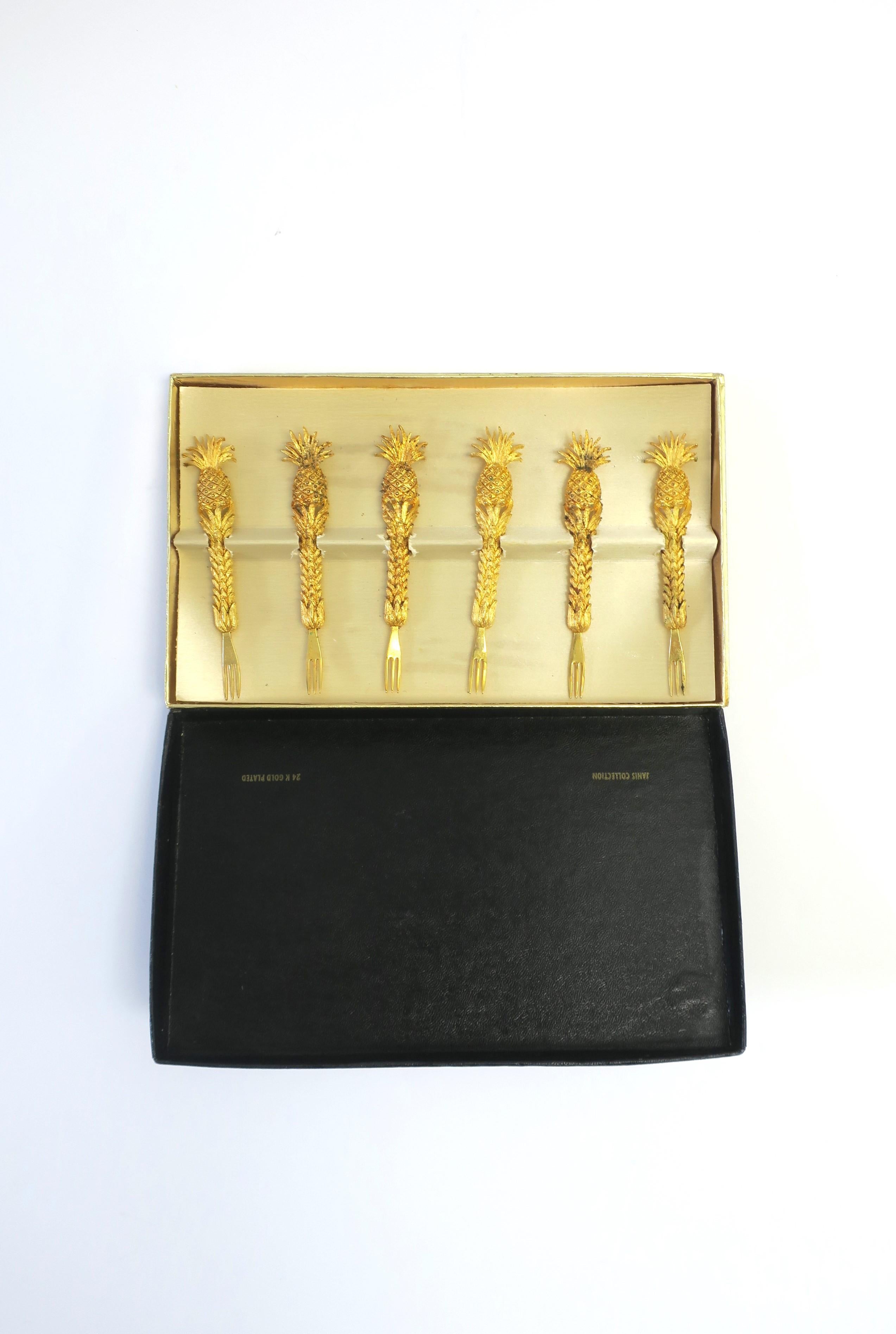 Two box sets of six (6) available. Each box sold separately as per listing. 

A substantial set of six (6) 24kt gold plated appetizer, canapé, or hor d'oeuvres forks with pineapple design, circa 1960s. A beautiful set for entertaining/dining, etc.