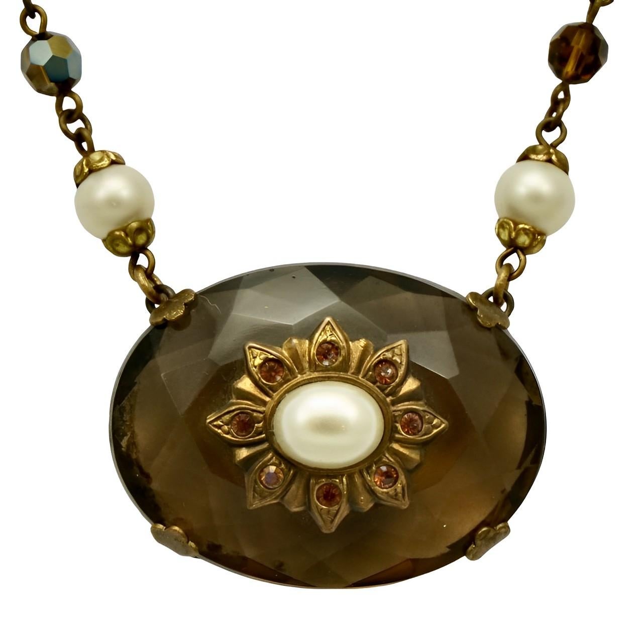 Fabulous gold plated necklace with aurora borealis and faux pearl beads, and featuring a large glass centrepiece with faux pearl and citrine rhinestones detail. Measuring length 52.5 cm / 20.6 inches including the extension. The centrepiece is