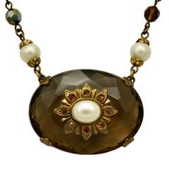 Gold Plated Aurora Borealis and Faux Pearl Necklace with a Glass Centrepiece