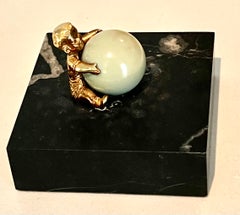 Gold Plated Boy Holding a Large Jade Sphere on a Carrara Marble Base