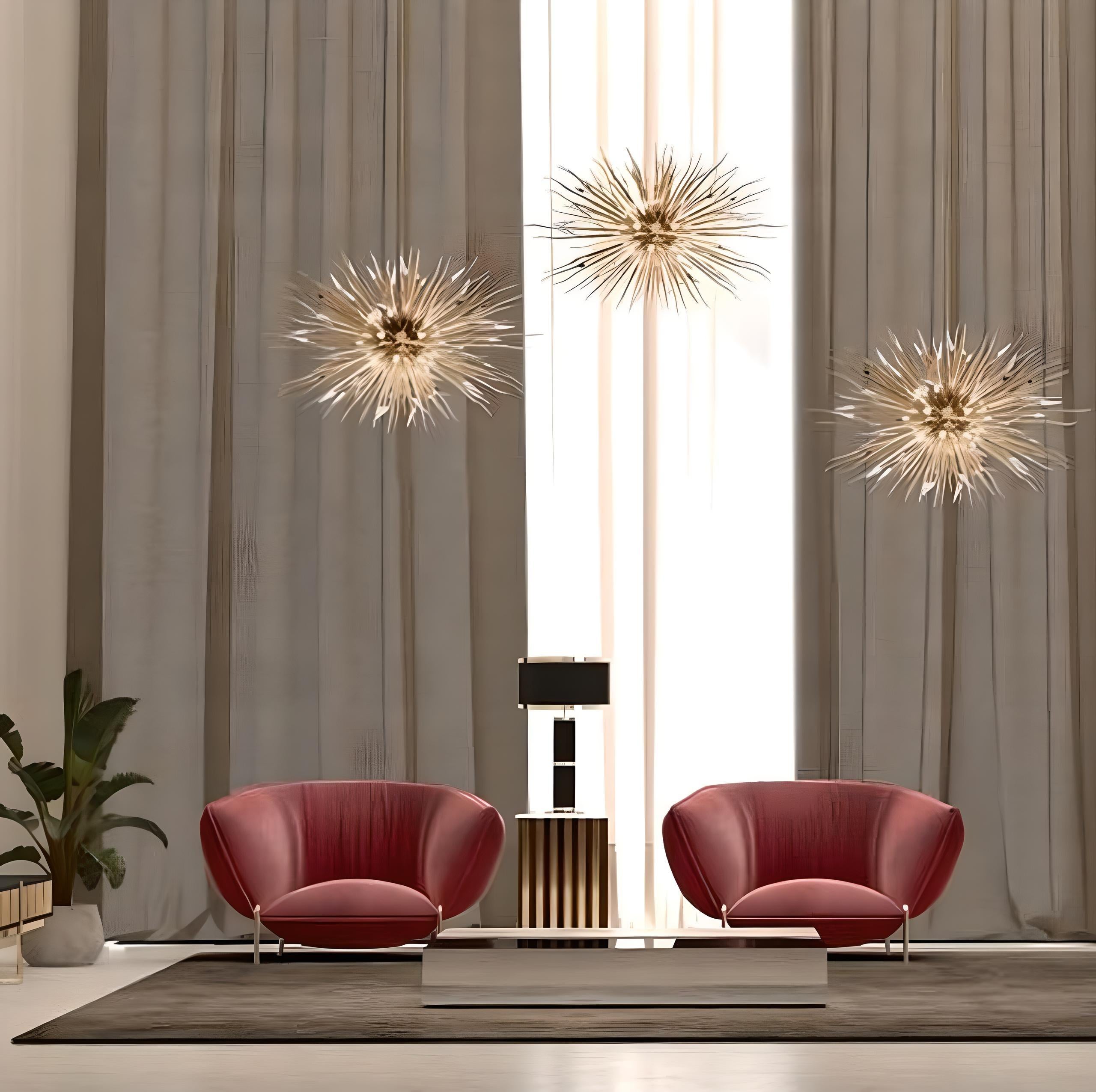 This suspension is designed to be the focal point of any interior project. Its crystals refract and reflect light, creating a gentle illumination that enhances its surroundings.

With alternating layers of curved and straight gold-plated brass