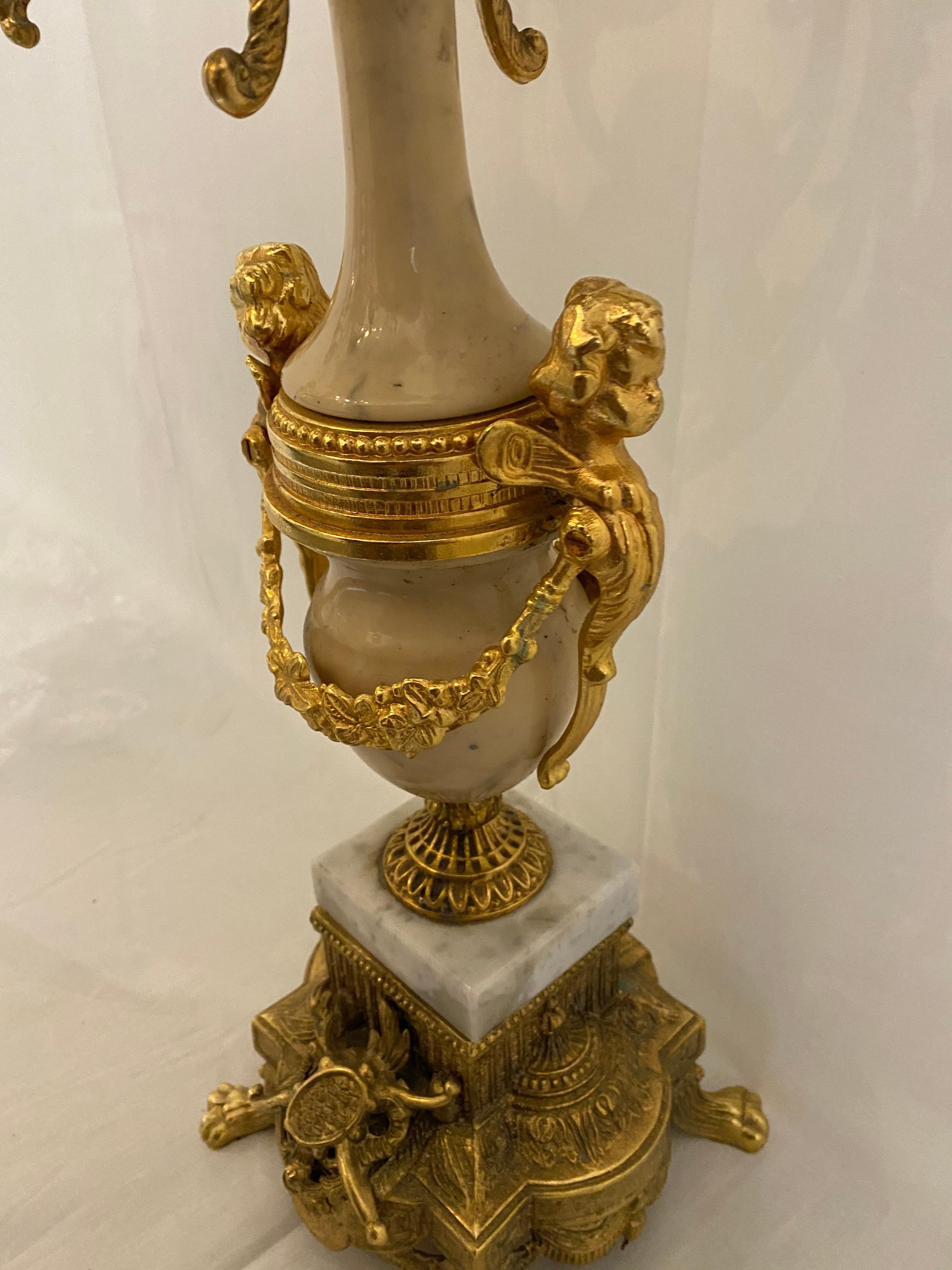 Beautiful gold-plated candelabra, with marble,.