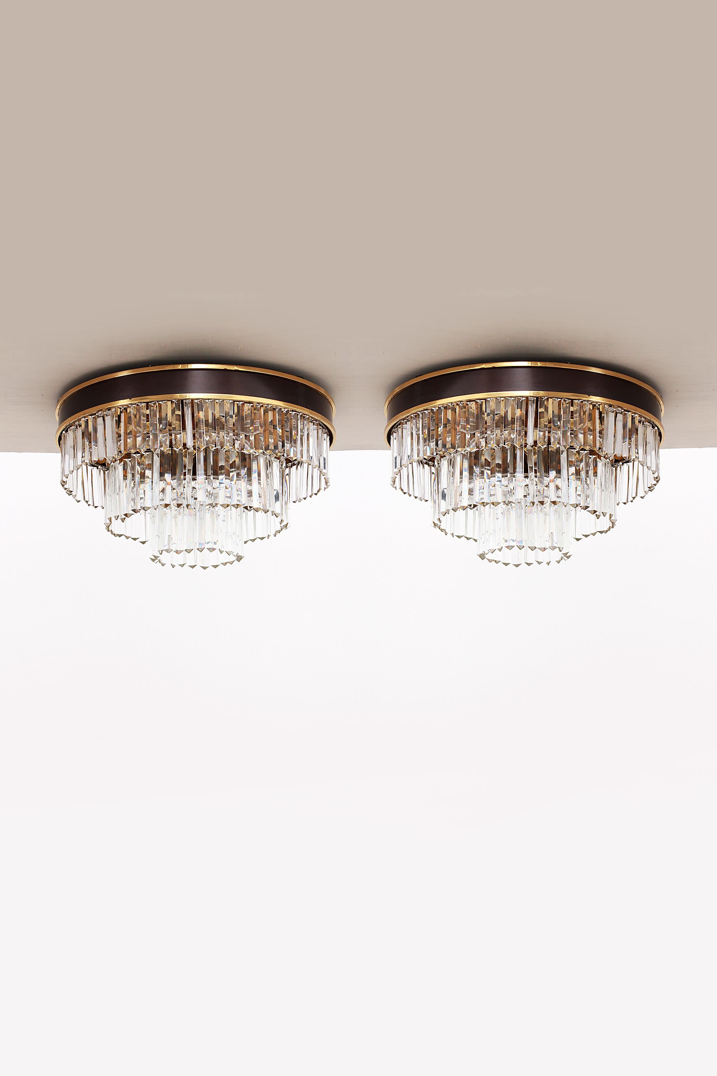 Gold-Plated Crystal Ceiling Lamp by L.A. Riedinger, set of 2

This set of two ceiling lamps or chandeliers are specially made on request.

The woman who first owned this lamp had seen this model hanging in the National Theater in Düsseldorf. She was