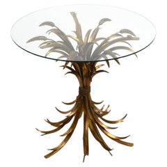 Gold-plated floral 1960s Regency side table with solid glass top by Hans Kögl