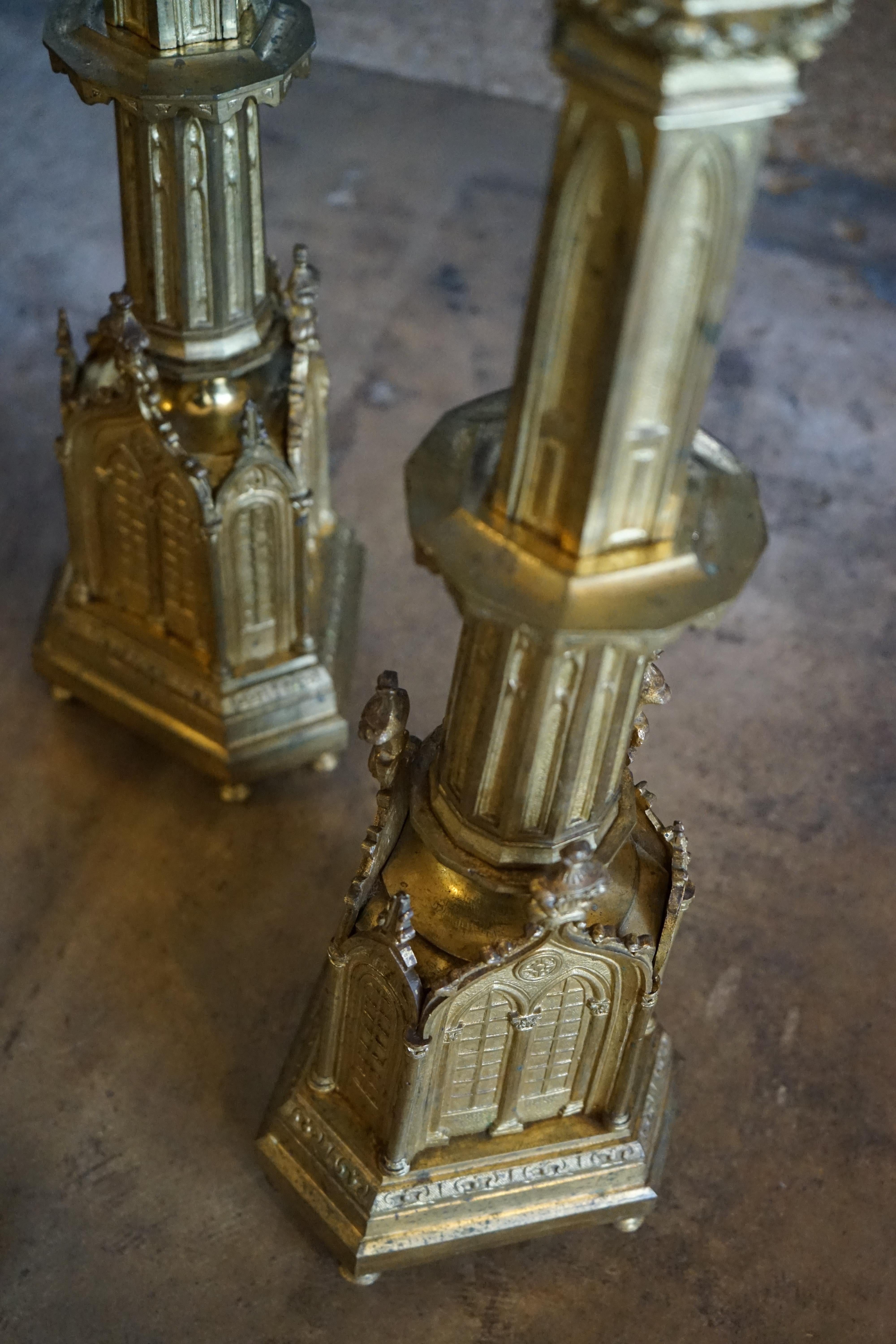 This pair of gold-plated candlesticks are made of brass and originate from France, circa 1880.

Measurements: 34'' H x 7.5'' D x 8.5'' W.