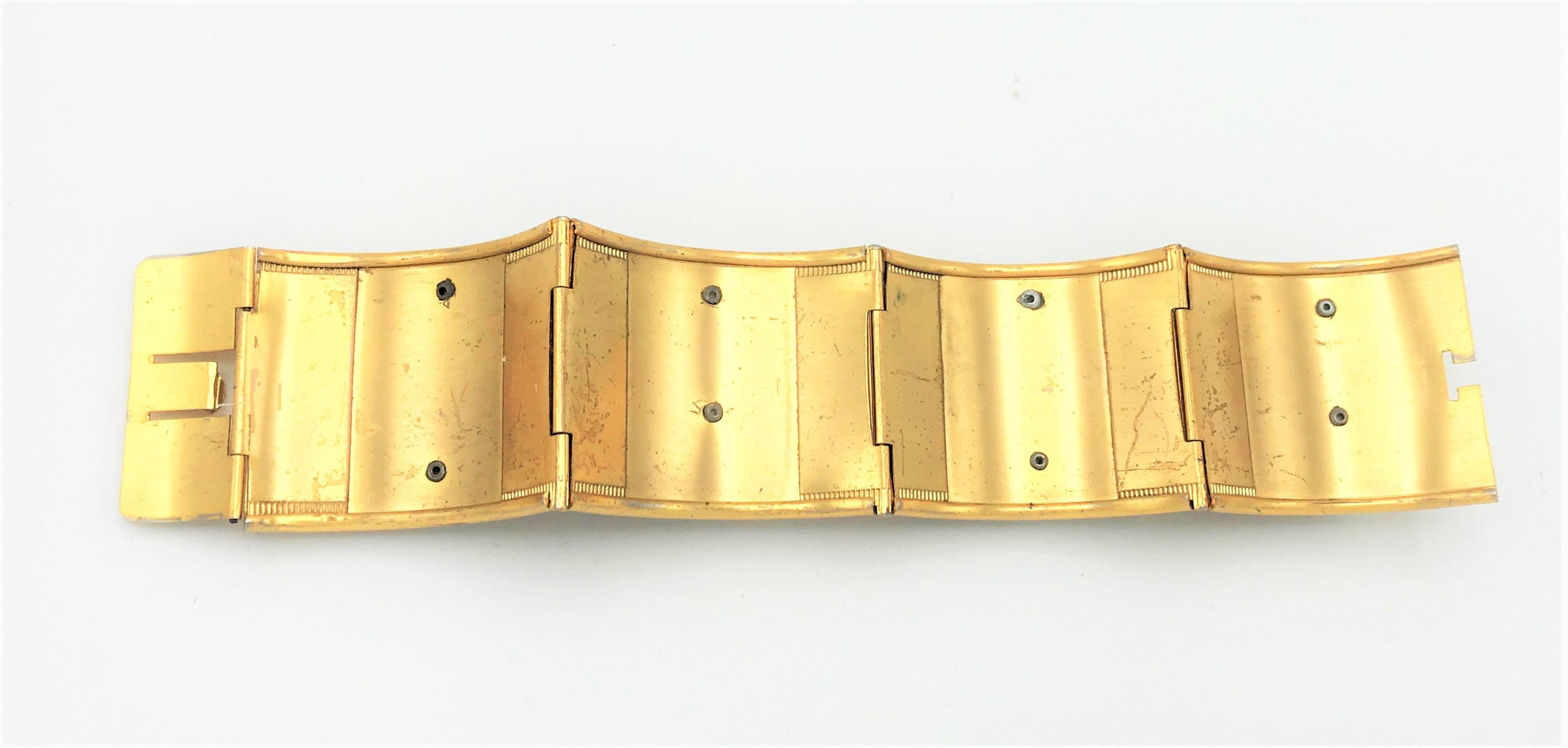 Women's Gold plated hinged bracelet with Coro enamel flowers attached from the 1940s, US For Sale