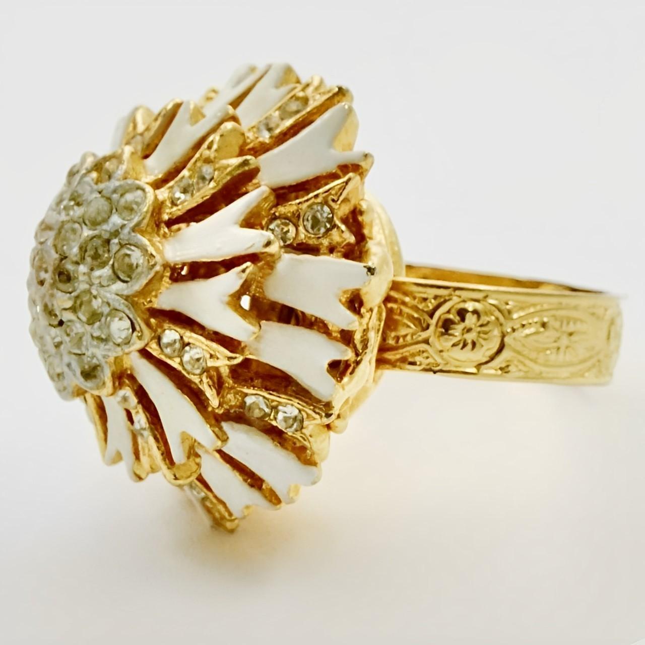 Fabulous gold plated cocktail ring with three layers of cream enamel and rhinestones. Ring size UK M / US 6, but adjustable. Measuring diameter 2.5 cm / .98 inch, and height 1.6 cm / .6 inch.

This is a beautiful and stylish cocktail statement ring