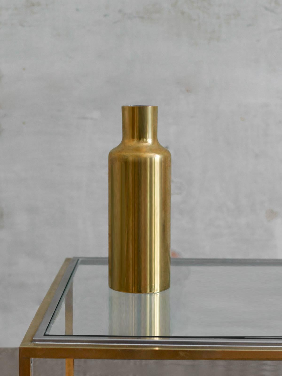 Gold-plated metal vase by Marino Marini, 1970
Product Details
Incised signature on the base.
Dimensions: 11 D x 30 H 