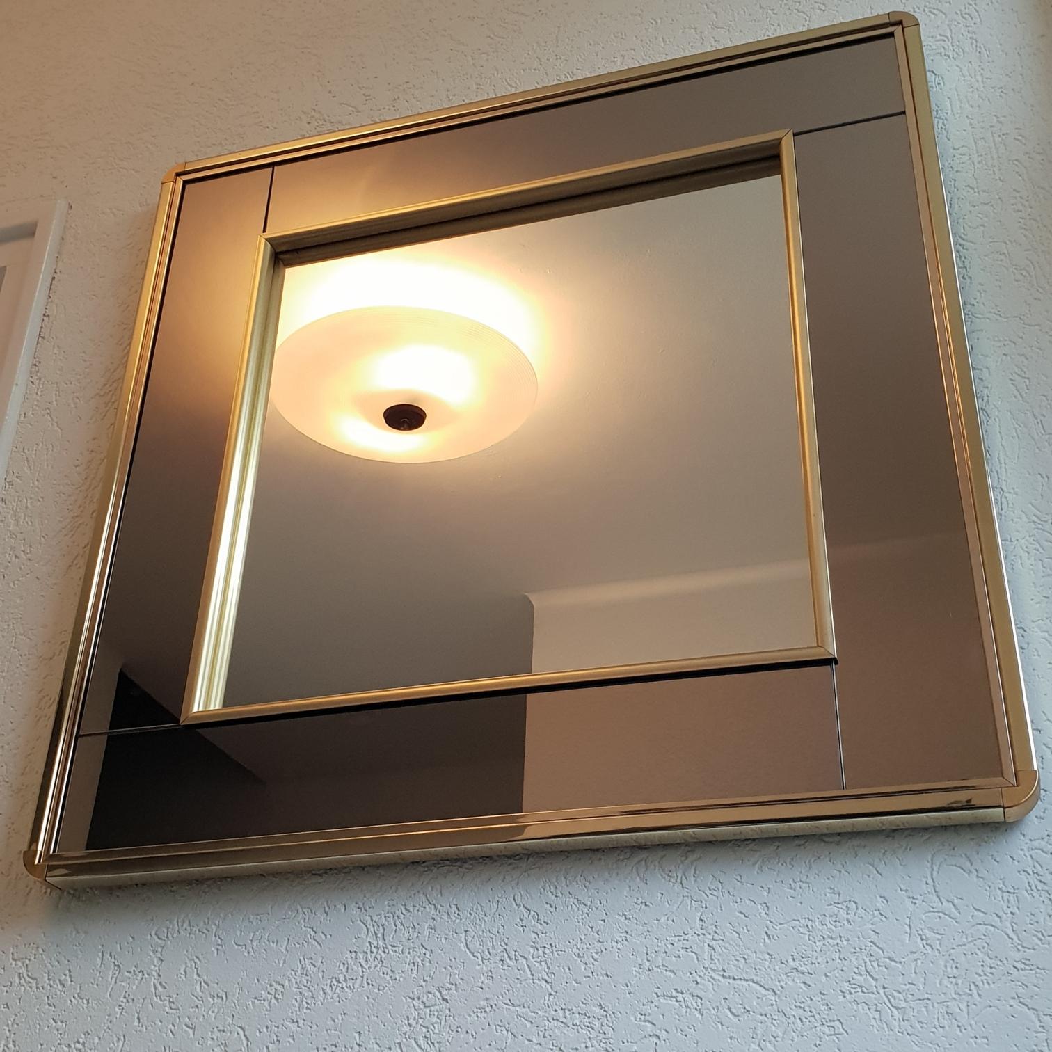 Gold-plated square mirror with smoked and clear mirror glass by Belgo Chrome, 1980s
In excellent vintage condition.
