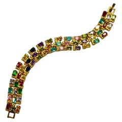Bracelet à maillons orné d'or et de bijoux en verre multicolores