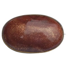 Vergoldete ovale Goldstein-Brosche um 1920