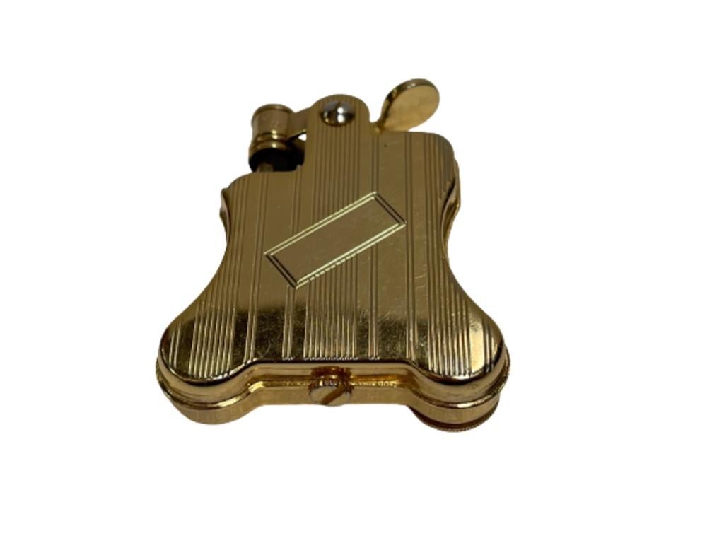 Late 20th Century Gold-Plated Ronson Banjo Stylish Design Petrol Lighter, Japan For Sale