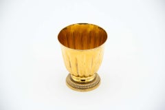 Gold-plated silver cup with circular base