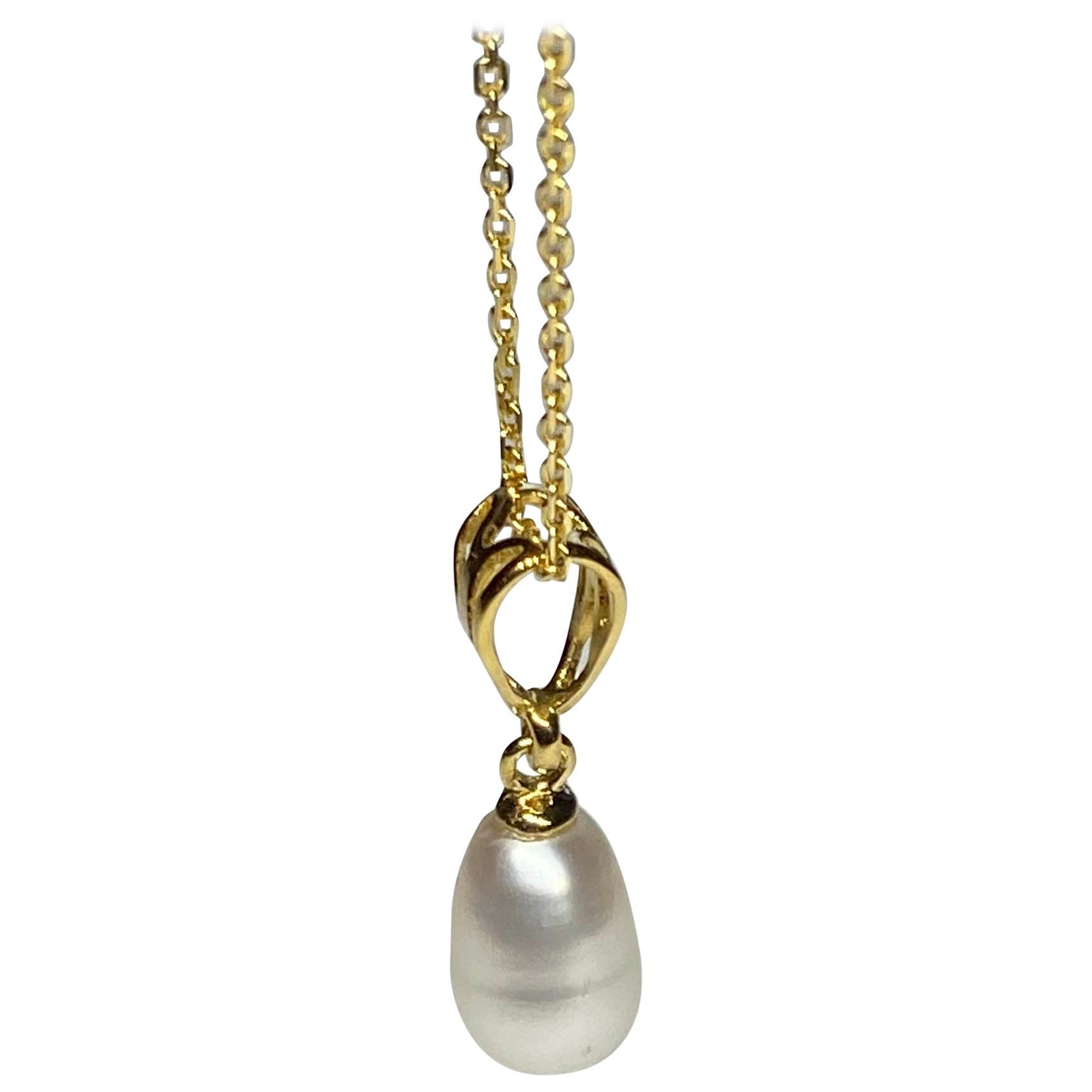 A Gold Plated Silver Pendant with a Freshwater Dangle Pearl For Sale