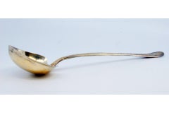 Gold-plated silver sauce spoon with raised handle and monogram card