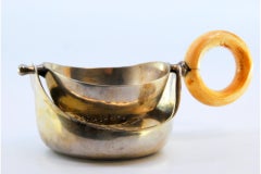 Gold-plated silver tea strainer with bone handle