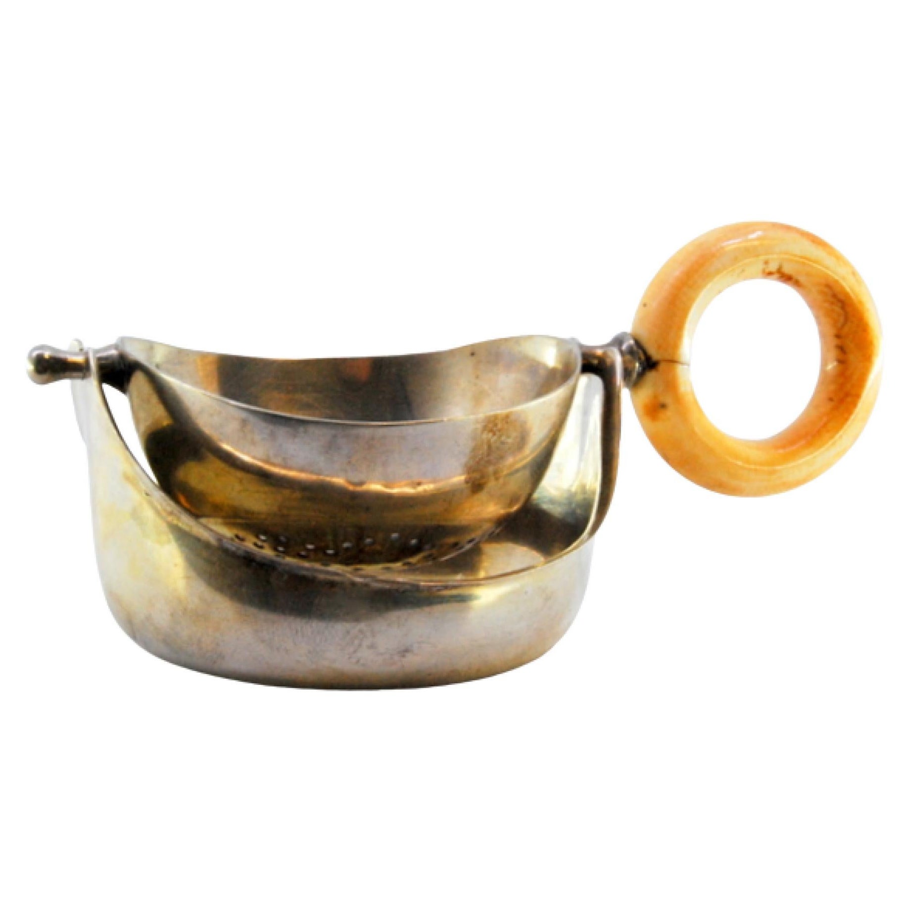 Gold-plated silver tea strainer with bone handle