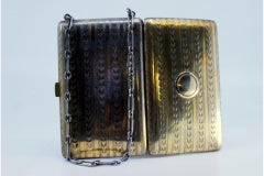 Gold-plated silver toiletry box with engravings, chain and mirror