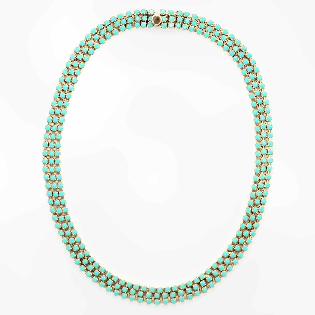 Beautiful gold plated necklace with three rows of faceted faux turquoise glass stones. Length 42 cm / 16.5 inches by width 9 mm / .35 inch. The necklace is in very good condition, with some scratching and wear to the gold plating as expected.

This