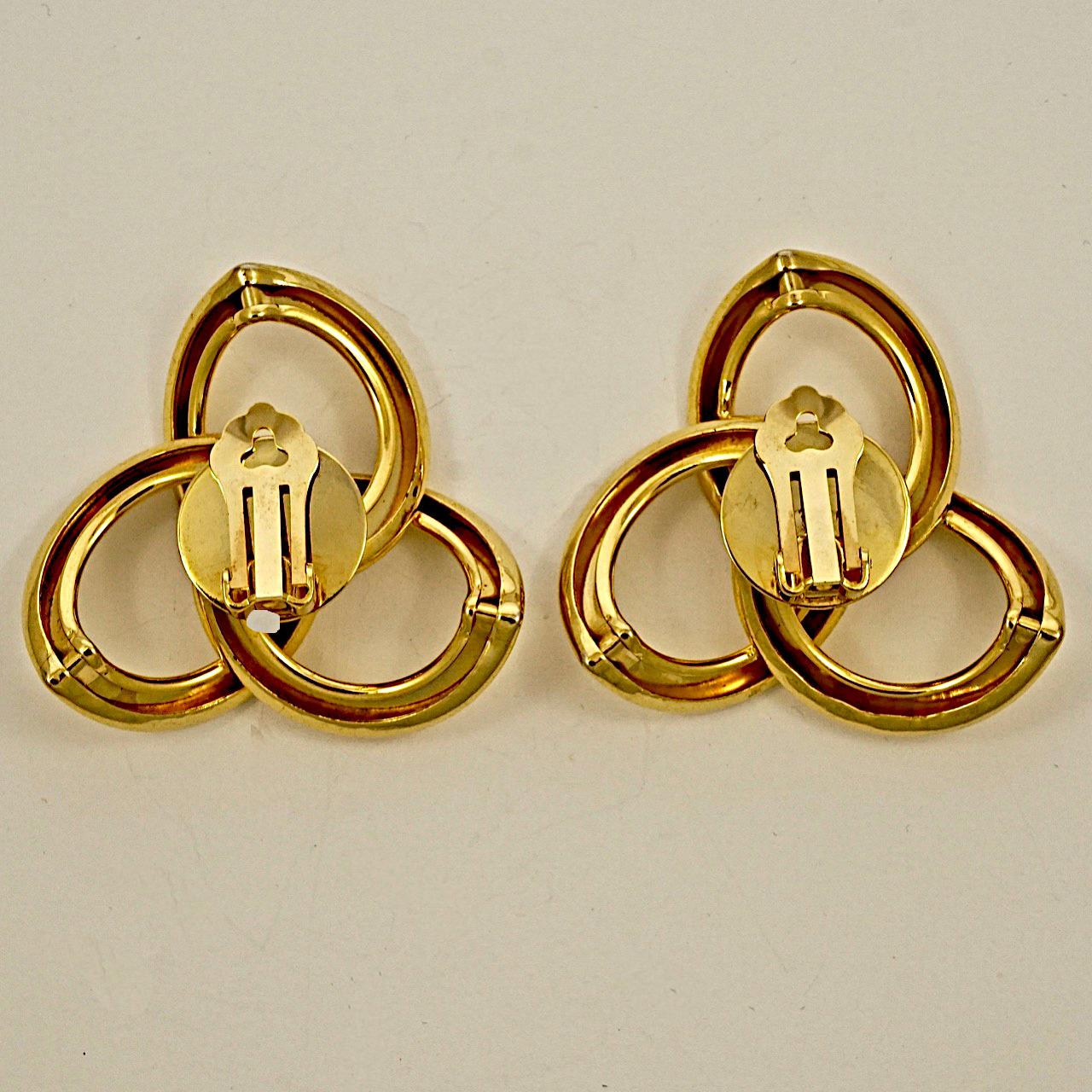 Women's or Men's Gold Plated Triple Hoop Clip On Statement Earrings circa 1980s For Sale