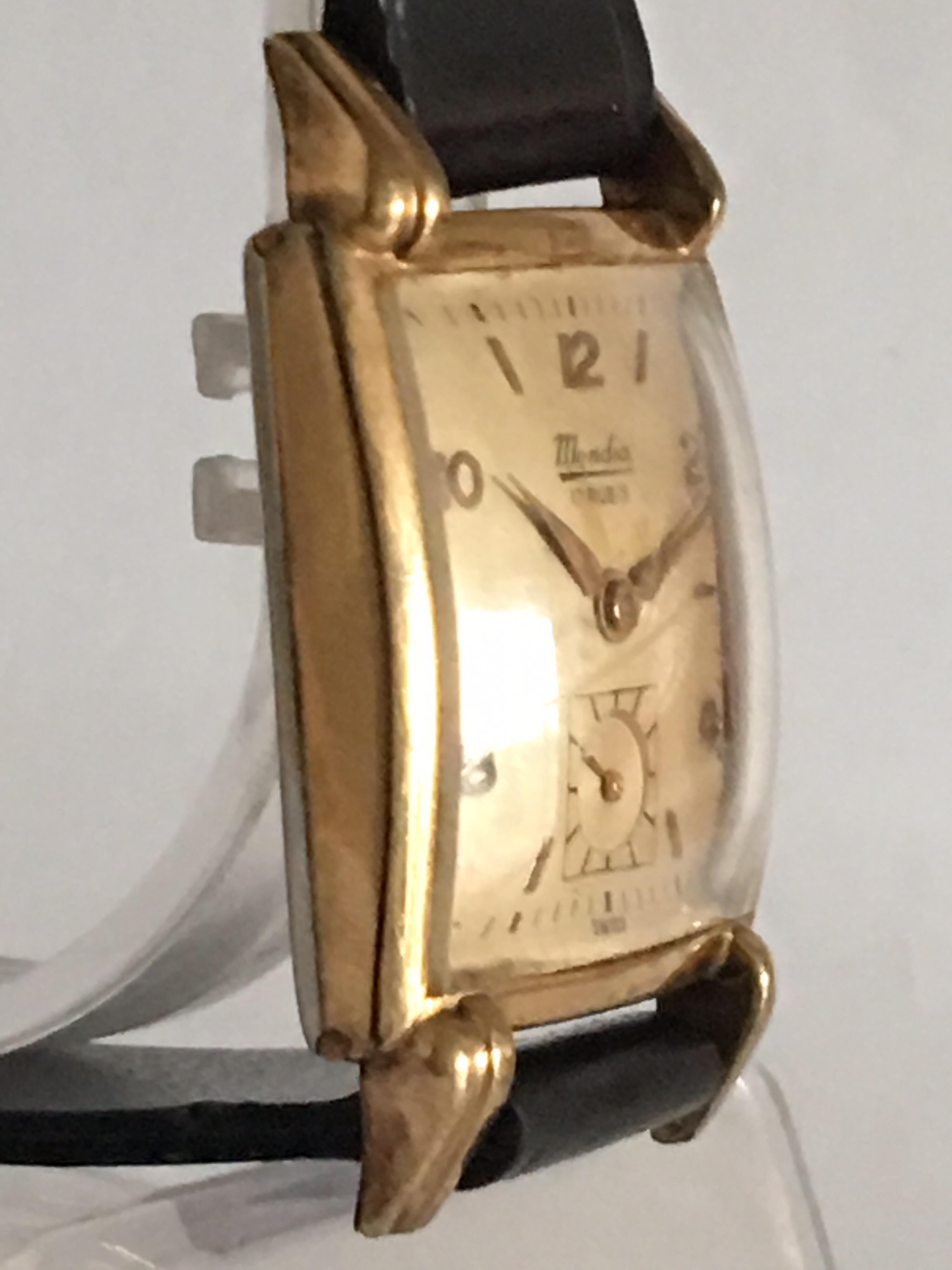 This Vintage watch is working and ticking well. 
Visible scratch on the middle of top glass and some marks on the dial. 
Please study the images carefully as form part of the description.