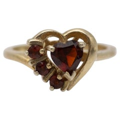 Gold plated vintage ring with garnet heart