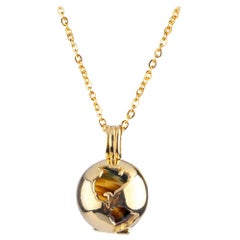 Gold plated World Globe Locket - Tiger's Eye