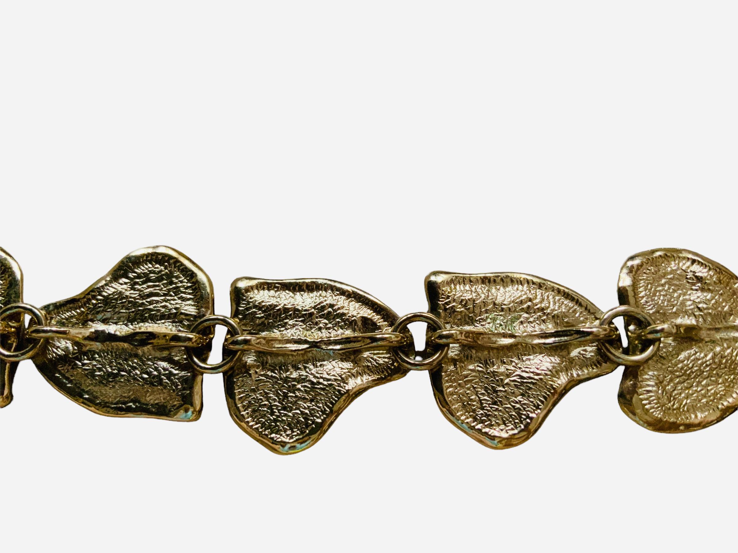 Modern Gold Plated Yves Saint Laurent Heart Link Bracelet  For Sale