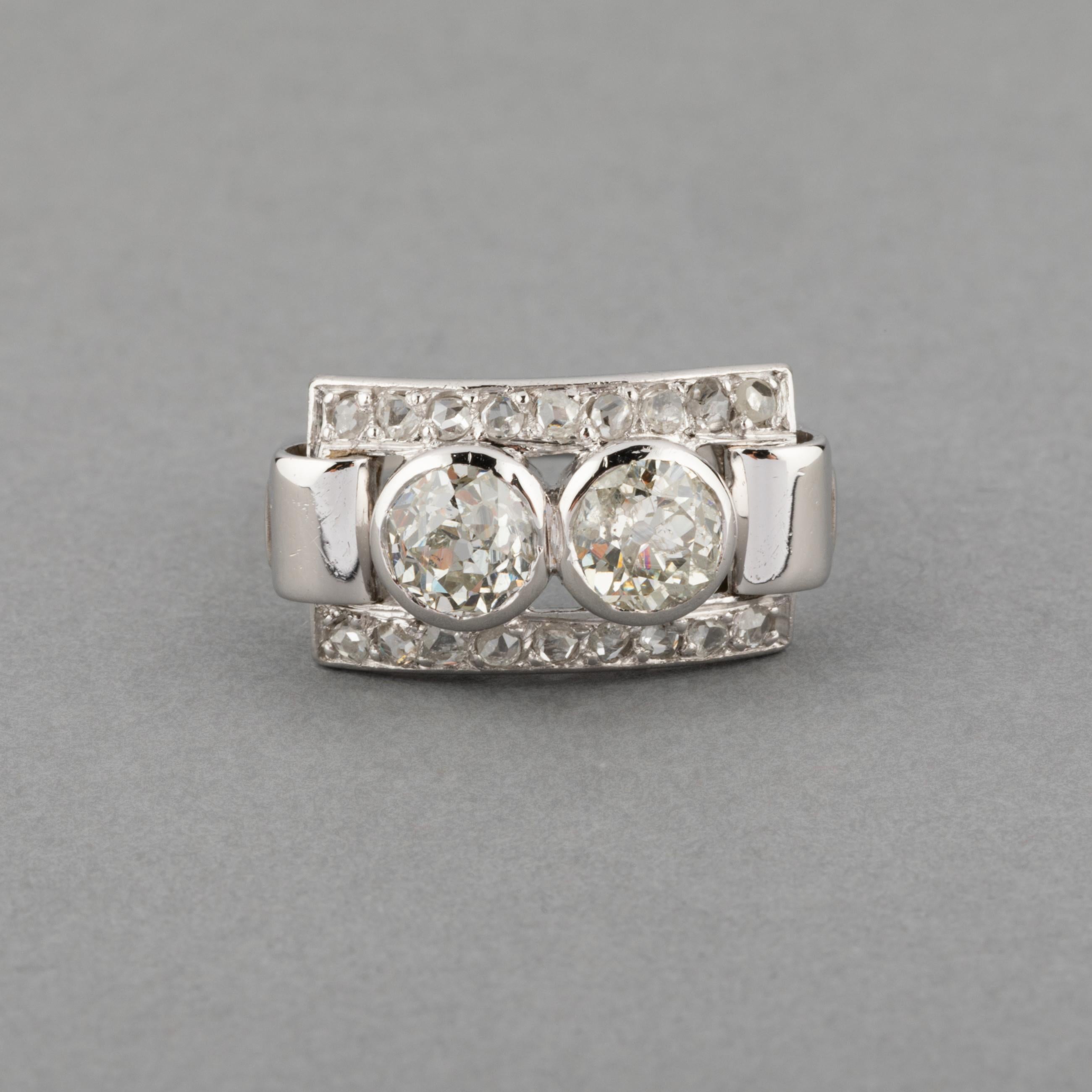 A very lovely French Art Deco ring, made in France circa 1930.

Made in white gold and platinum, set with two old European cut diamonds of 0.50 carats each. The diamonds color is I/J and clarity SI1/SI2.

Ring size: 53 or 6.20 USA.

Weight: 4.60