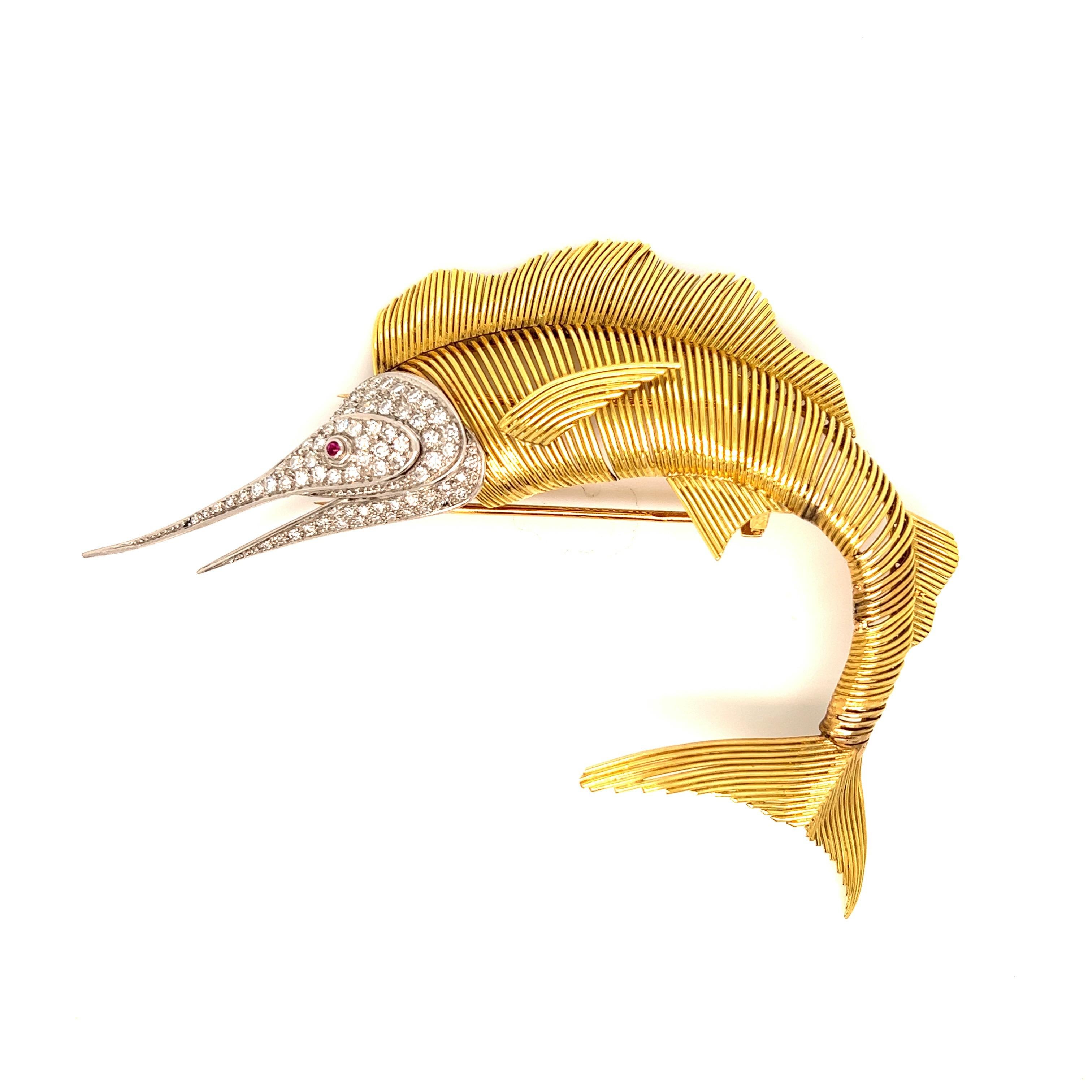 Gold platinum diamond sailfish brooch

Single-cut diamonds, 18 karat yellow gold; marked with French import stamps, 750 

Size: width 3.63 inches, length 2.88 inches
Total weight: 26.8 grams 