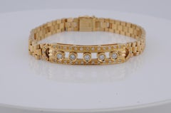 Gold president bracelet with diamonds