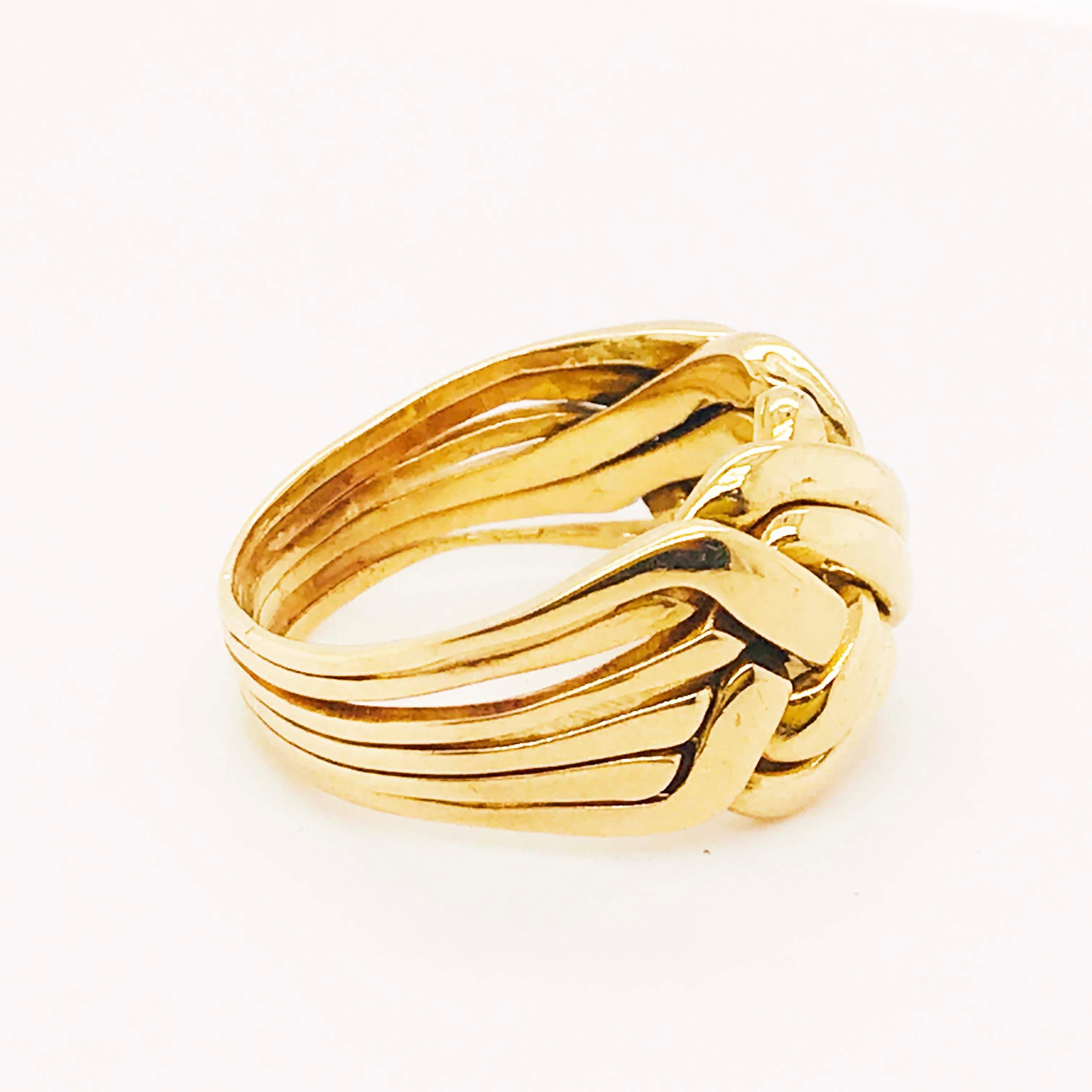 This gold puzzle ring is an intricate and retro design. Made with solid 14k yellow gold, this ring has a rich yellow gold color and high polish finish. The puzzle ring is an original puzzle design that has been soldered together. Puzzle rings are