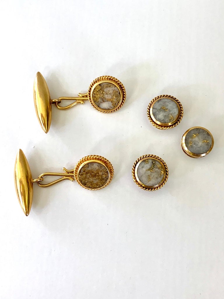 This is an absolutely fabulous cufflink and button set. T hey are made from highly sought after gold quartz.  Look at the beautiful matrix in these pieces.  It's easy to see why it is so much in desire.
Each cufflink and each button, are round with