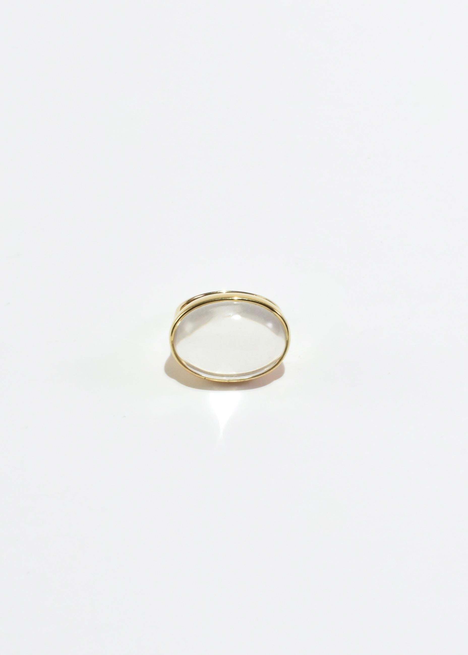 Stunning gold ring with oversized quartz cabochon by Sapir Bachar. Made from 24k gold plated recycled sterling silver, handcrafted in Israel. Shipped in Sapir Bachar's signature organic white twill pouch with black leather cord.

Material: 24k gold,