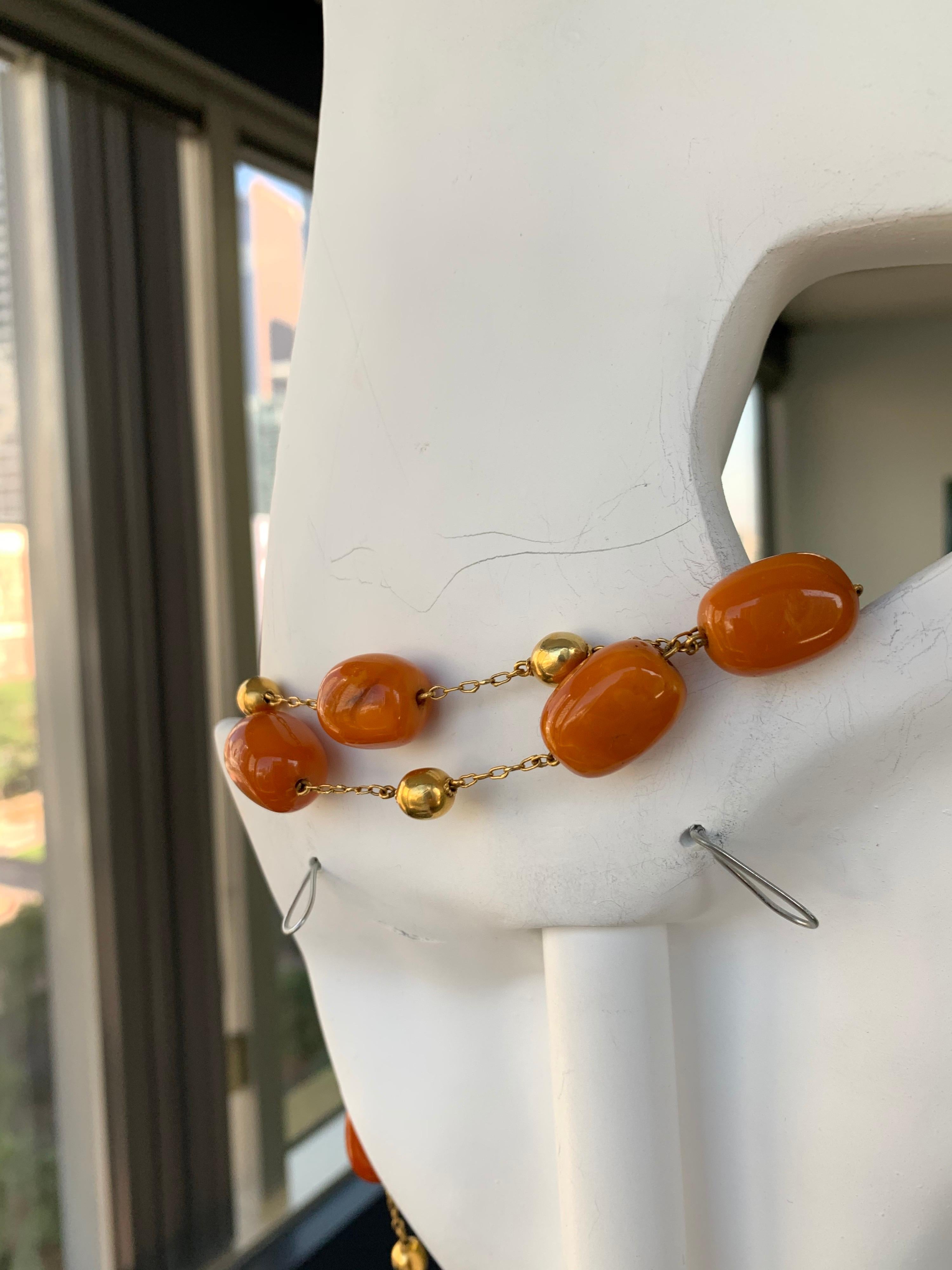 Gold Retro Natural Butterscotch Egg Yolk Amber Gem Necklace Bead, circa 1950 In Good Condition For Sale In Los Angeles, CA