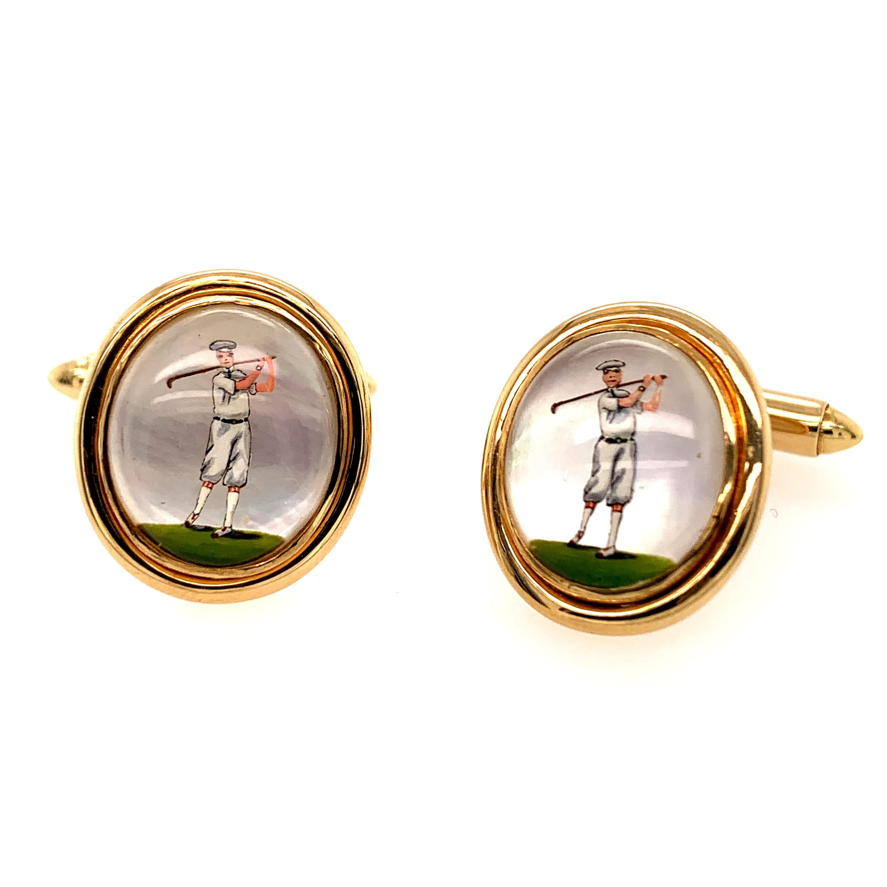 Distinctive reverse crystal cufflinks, depicting a golfer dressed in vintage clothes, swinging a golf club.  Set in 18K yellow gold.  3/4