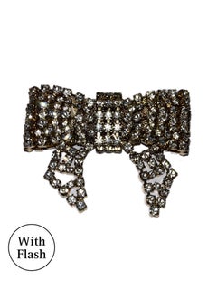 Spilla con fiocco strassato in oro di Daniel Swarovski