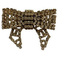 Gold Rhinstoned Bow Brooch by Daniel Swarovski