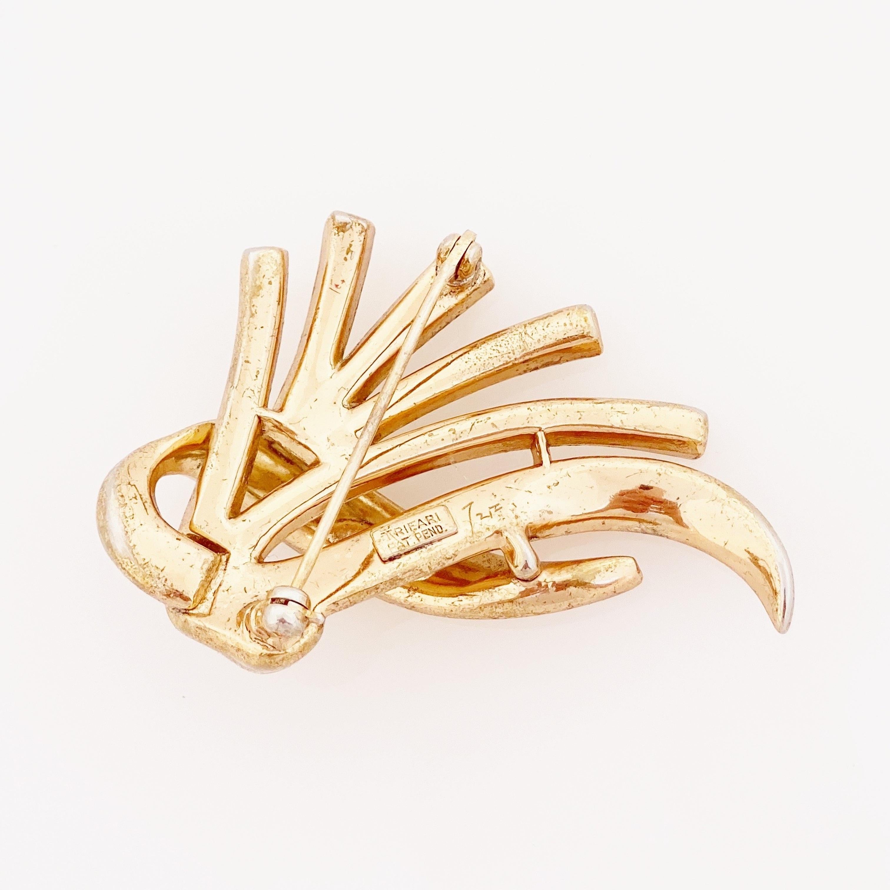 Gold Ribbon Brooch With Baguette Crystal Spray By Alfred Philippe For Trifari For Sale 1