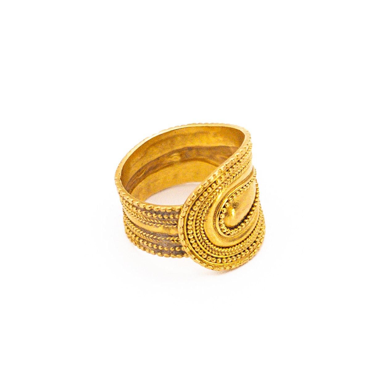 This beautiful 18 K Gold ring has the shape of a spatula lined with filigree, an ancient greek technique. Signed Lalaounis

Lalaounis’ vision became clear: he decided to breathe new life into Greek museum artifacts and transform them into jewelry by