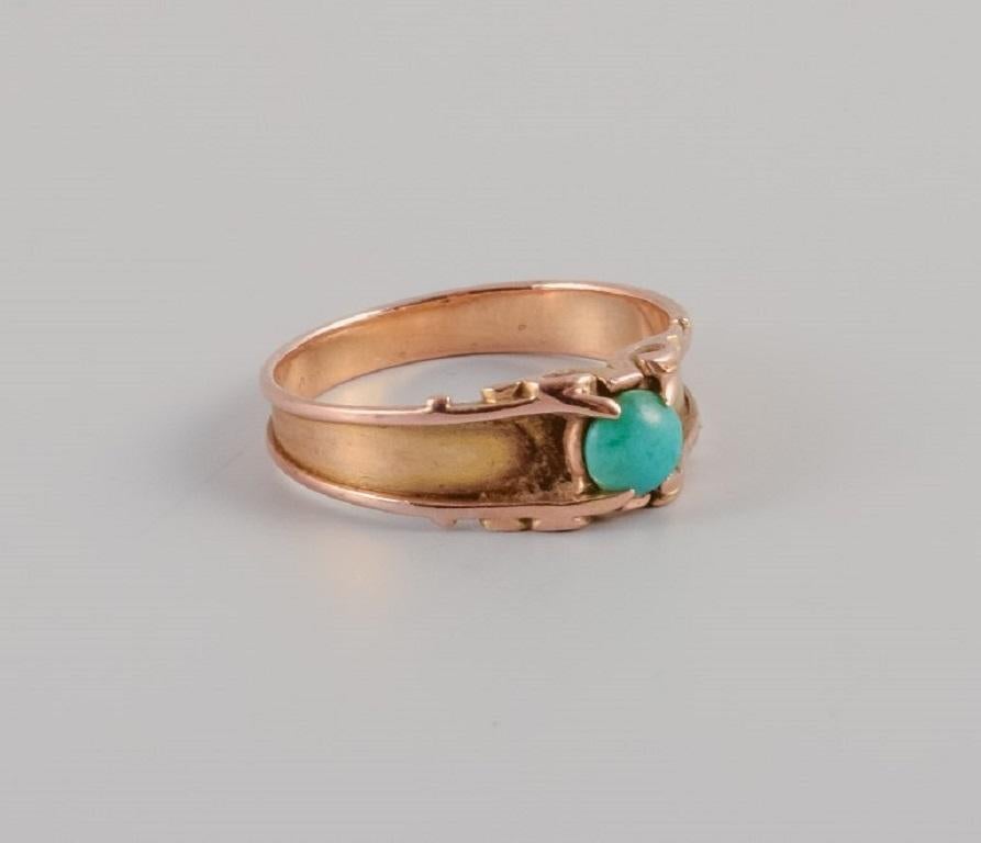 Gold ring decorated with green stone, Scandinavian goldsmith, 1920s/30s. 
Indistinctly stamped with the goldsmith's initials.
Measured at 14 carats.
In good condition
Ring size 17 mm.
U.S. size 6.50

Our professional goldsmith, trained at Georg