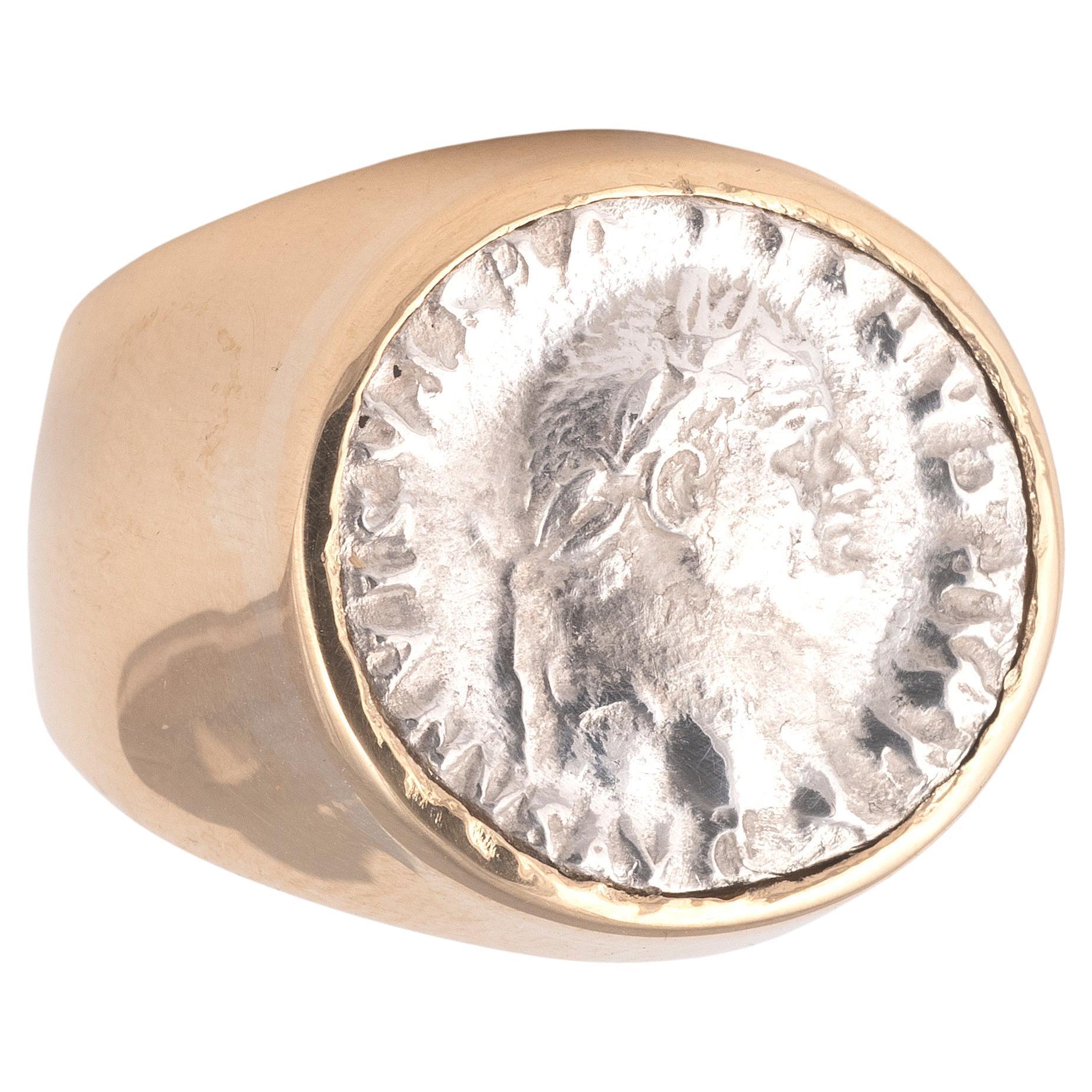 This genuine Ancient Roman silver coin of Emperor Vespasian has been mounted in a stunning modern 18 Karat gold ring.
Size : 8
Weight: 11.08

T. Flavius Vespasianus was barn at Falacrina in A.D. 9, the son of Flavius Sabinus, a tax collector, and