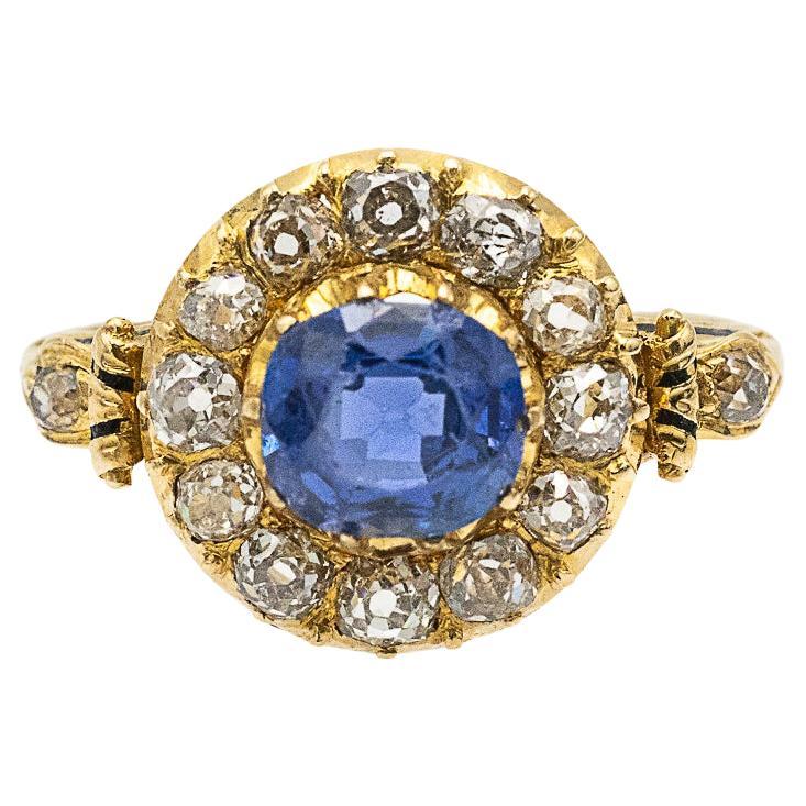 Gold ring from early 20th century with natural sapphire and diamonds.