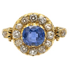 Gold ring from early 20th century with natural sapphire and diamonds.