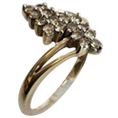 Gold Ring in 14 Karat with 16 Small Stones