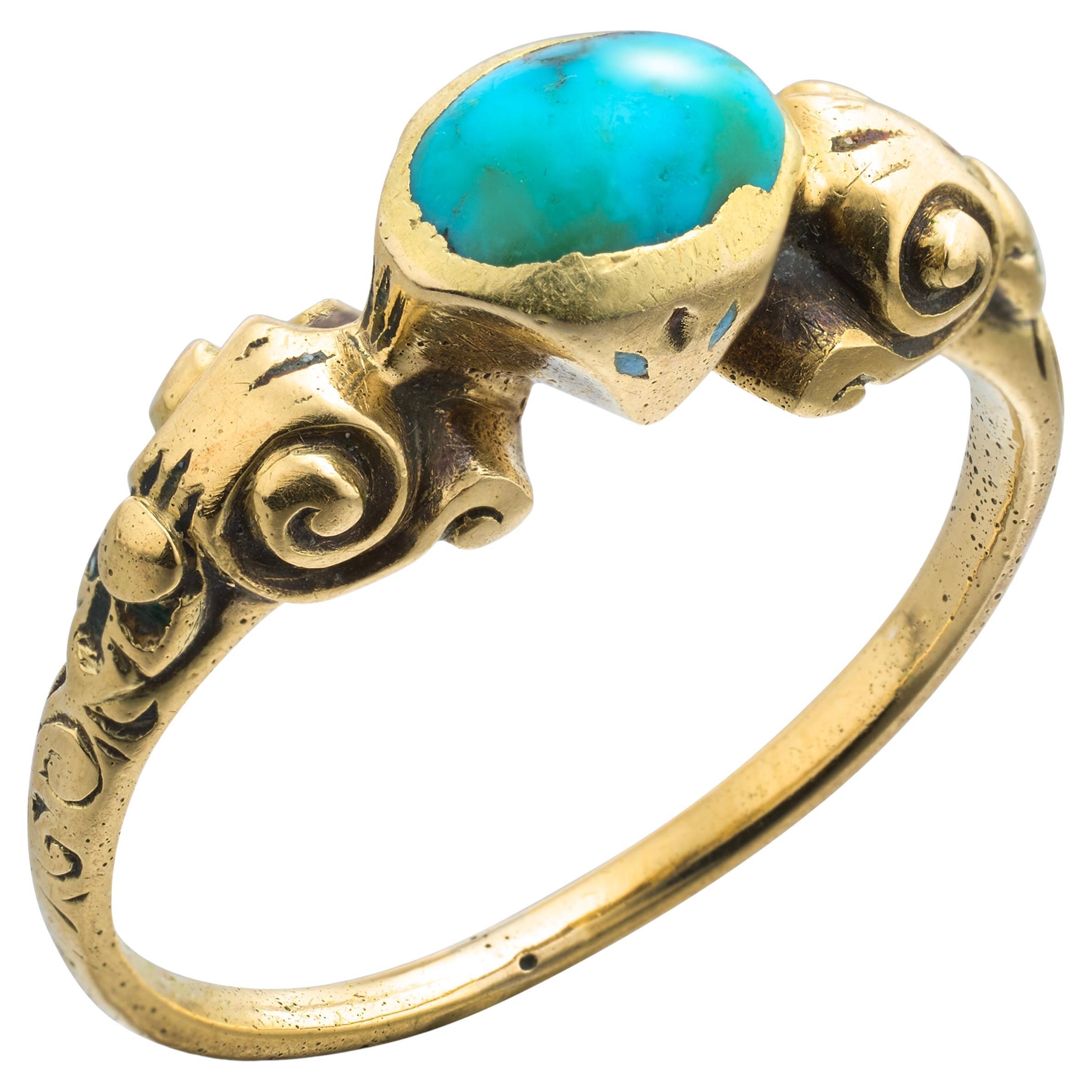 Bague en or sertie d
une turquoise cabochon. Europe occidentale, début du XVIIe siècle.