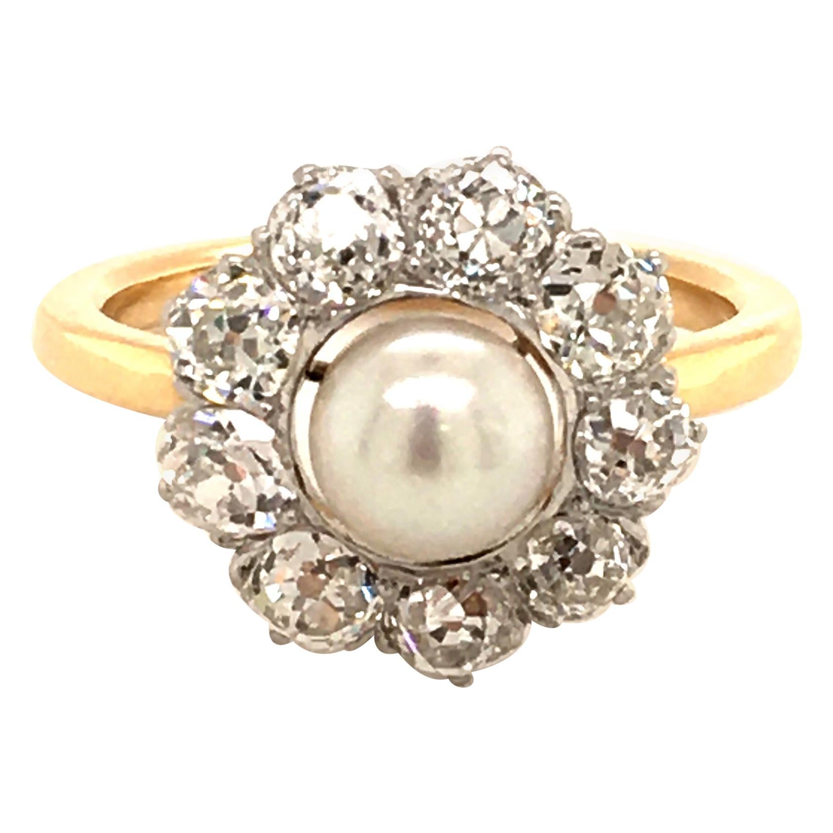 Gold Ring Set with a Natural Pearl Surrounded by Oldcut-Diamonds