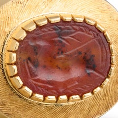 Gold Ring Set with an Ancient Carnelian Scarab Depicting a Deer Hunt.